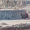 Earth mover in a surface mine quarry