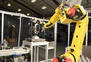 A FANUC robot loads the Equator in the automated cell