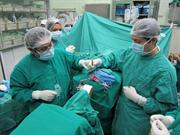 First procedure with the neuromate stereotactic system taking place at the Neurosurgery Department of Hospital Nacional Guillermo Almenara in Lima