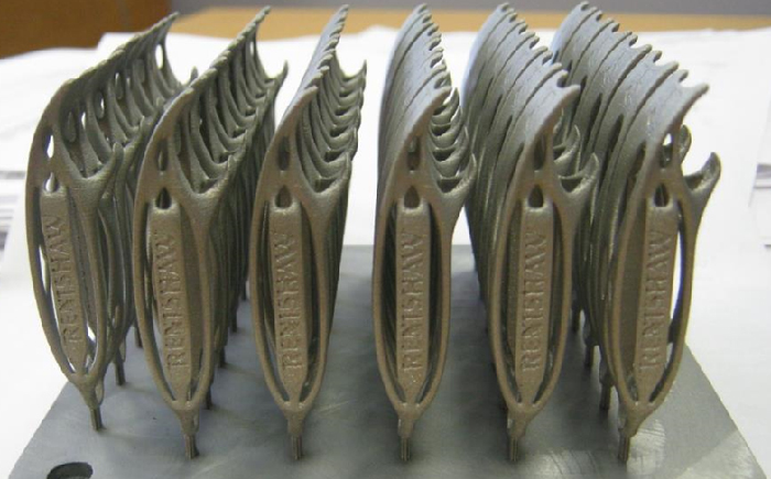 Renishaw bottle openers on an AM build plate