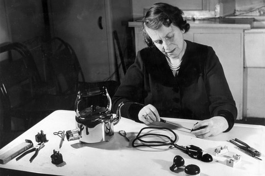 Caroline Haslet working at her desk