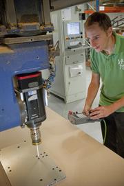 Tods Composite Solutions: CMS router fitted with RMP600 touch probe