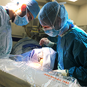 Surgical team at Birmingham Children's Hospital using the neuromate robot
