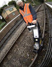 Sperry - ‘Walking Stick’ the inspection tool which the operator pushes along the railway track