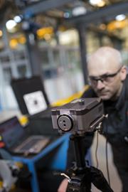 Craig Simpson, Maintenance Technician at FMC Technologies, using the XL-80 laser calibration system to check machine accuracy.