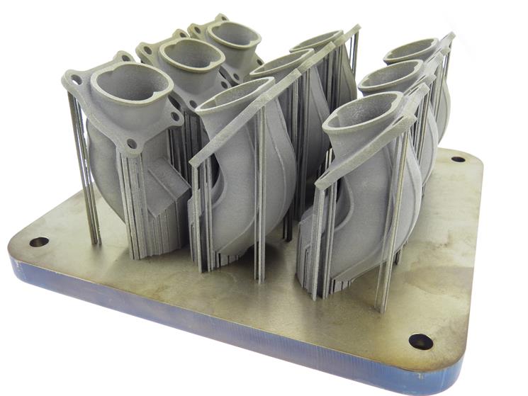 Exhaust manifolds on build plate with supports in nickel alloy