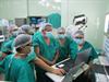 Dr Camilio Contreras Campana (centre) led the first NeuroMate procedure at the Hospital Nacional Guillermo Almenara in Lima, Peru