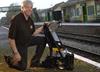 Sperry - George Dodd, Field Service Manager for Sperry International, with the company’s Walking Stick