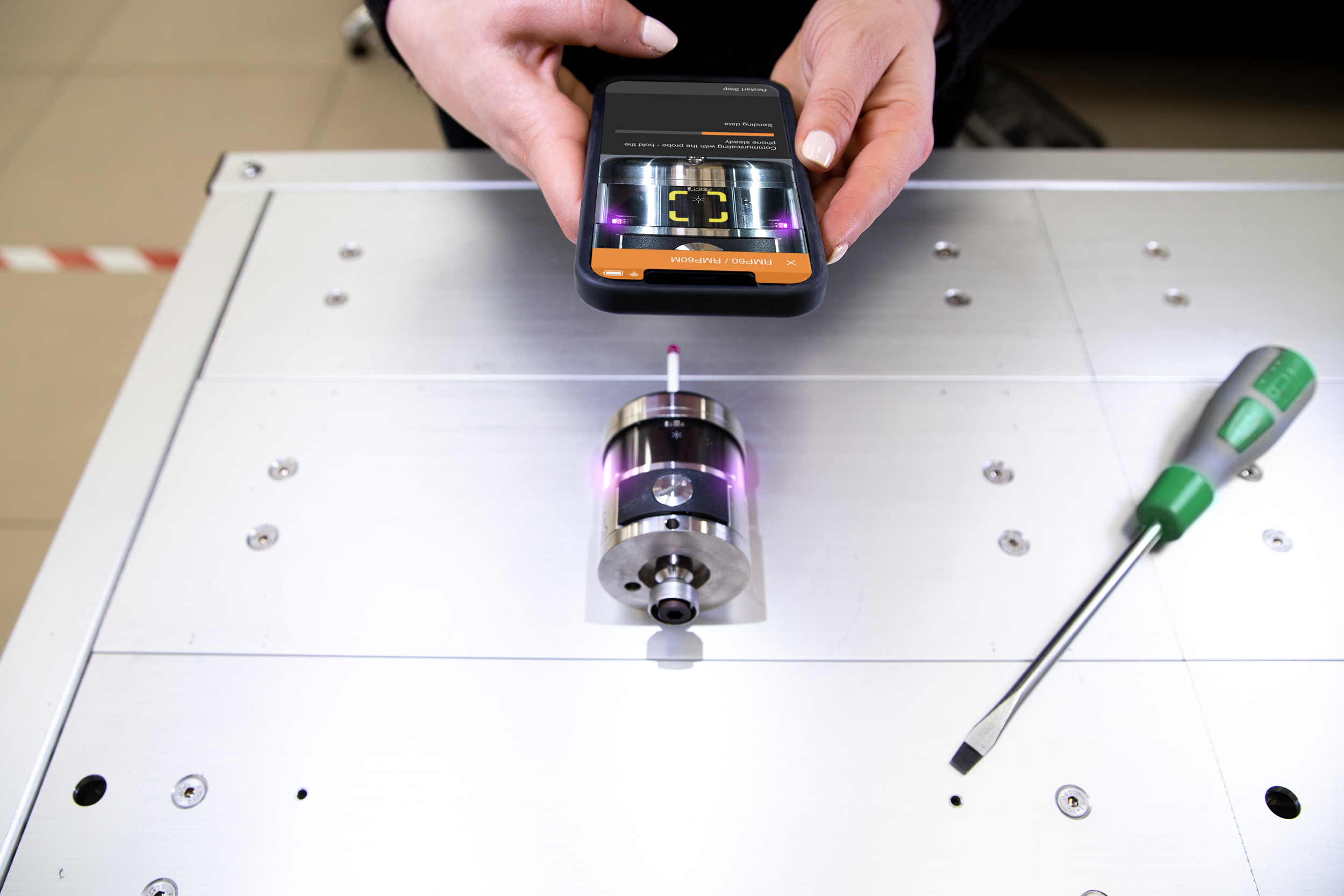 Probe set-up app performing Opti-Logic on an RMP60 touch probe