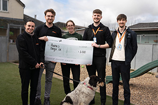 Renishaw donation to Aura's Dogs rescue charity