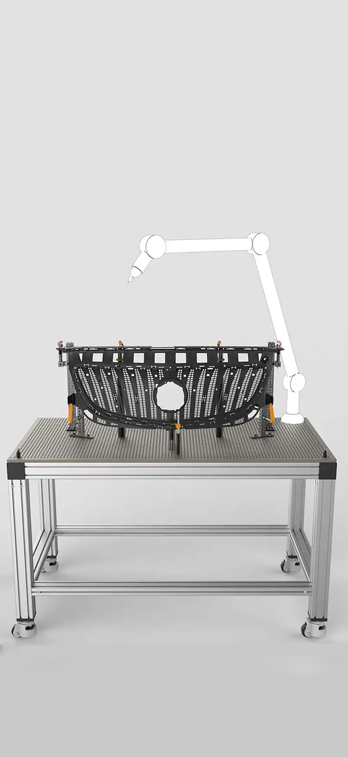 Tavola di fissaggio per applicazioni metrologiche con calandra di auto