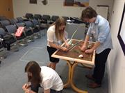 Young Engineers take part in a measuring activity