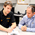 Narcis Georgescu, Senior Quality Supervisor at Linex (right) consults with Renishaw applications engineer