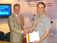 Dr. Andrew Shubin of NT-MDT (Russia) and Dr. Ken Williams of Renishaw plc (UK) signing the OEM agreement