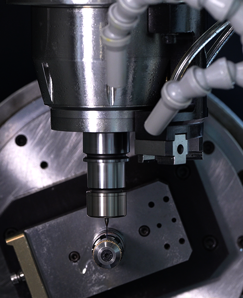 OMBI OM200 machine machining a ring