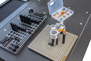 Montaje de fijaciones para CMM