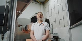 Gary Pearson from Effective CNC in front of CNC machine