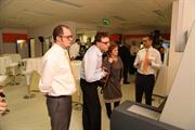 Watching a demonstration at the opening of new office at Renishaw Sp. z o.o.