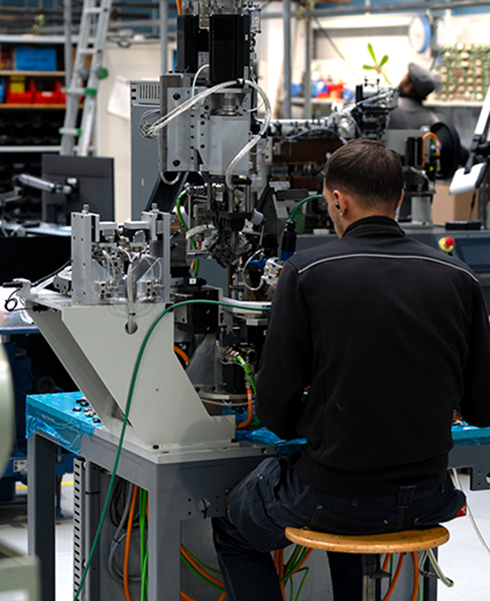 OMBI machine manufacturer engineer working on an OMBI chain making machine