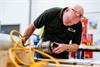 Engineer at MTT checking equipment