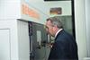 Liam Fox with Renishaw metal additive manufacturing machine