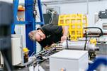 Applications engineer at MTT checking equipment