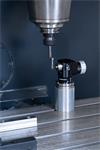 OTS (optical tool setter) setting an end mill