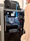 Behind the scenes filming Esmee Howard, Mechanical Engineering Apprentice, drawing the Renishaw emblem on a CNC