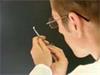 Researcher inspecting dental component
