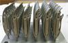 Renishaw bottle openers on an AM build plate
