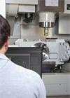 AxiSet™ Check-Up on laptop with machine tool in background