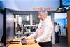 Employee looking at software demonstration at Control 2025