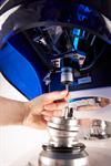 SP25 probe being lined up to scan a tooth prep on a Renishaw incise scanner