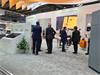 People and stand staff on the exhibition stand at EMO Milano 2021