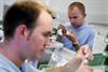 Two lab technicians
