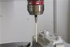 Renishaw styli on a BLUM touch probe scanning a metal workpiece