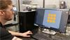 Mott Corp technician using AM software