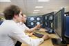 Software graduate at desk