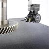 REVO­® 5-axis measurement system fitted to a CMM measuring a gear component.