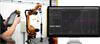 A robot operator tests a robot with an RCS L-90 ballbar. A desktop monitor shows volumetric path performance graph data