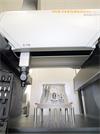 Fixturing components securing a workpiece with standoffs and clamps on an AGILITY® plate, on an AGILITY CMM