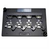 Custom fixture using Spring loaded clamps to hold four parts in two orientations