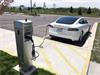 Electric car charging point at the new headquarters building for Renishaw, Inc.