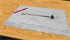 Drawing of custom stylus and the actual stylus once manufactured