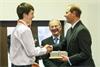 Renishaw apprentice Morgan Lloyd presents a 3D printed metal replica of Renishaw's 1802 mill building to HRH The Earl of Wessex